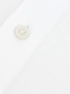 Chemise col rond en dobby blanc avec bouton doré
