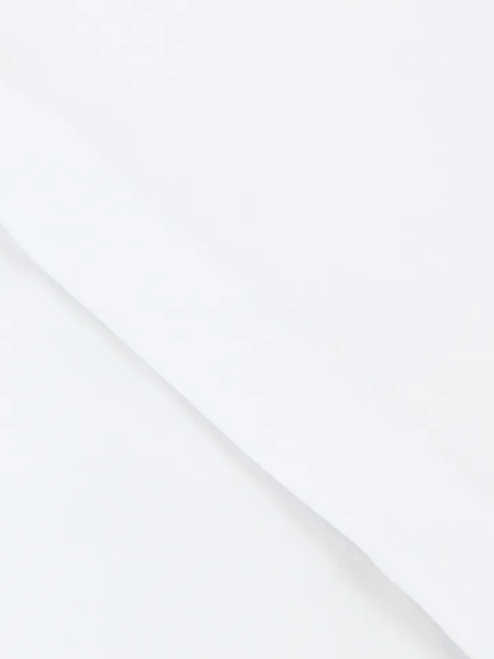 Chemise col rond en popeline blanche