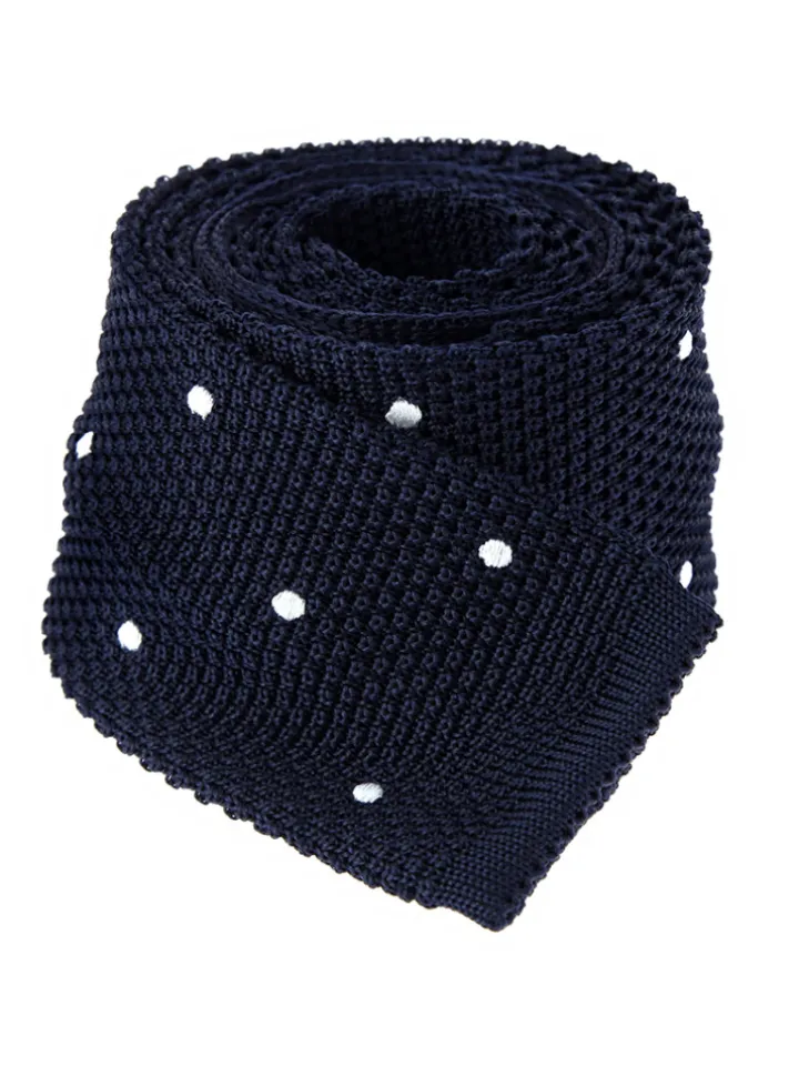 Cravate tricot en soie bleu marine à pois blancs