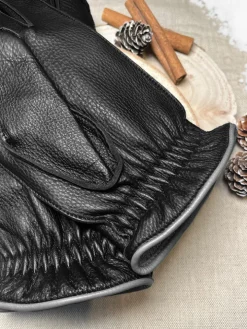 Gants en cuir tactiles noirs couture extérieure