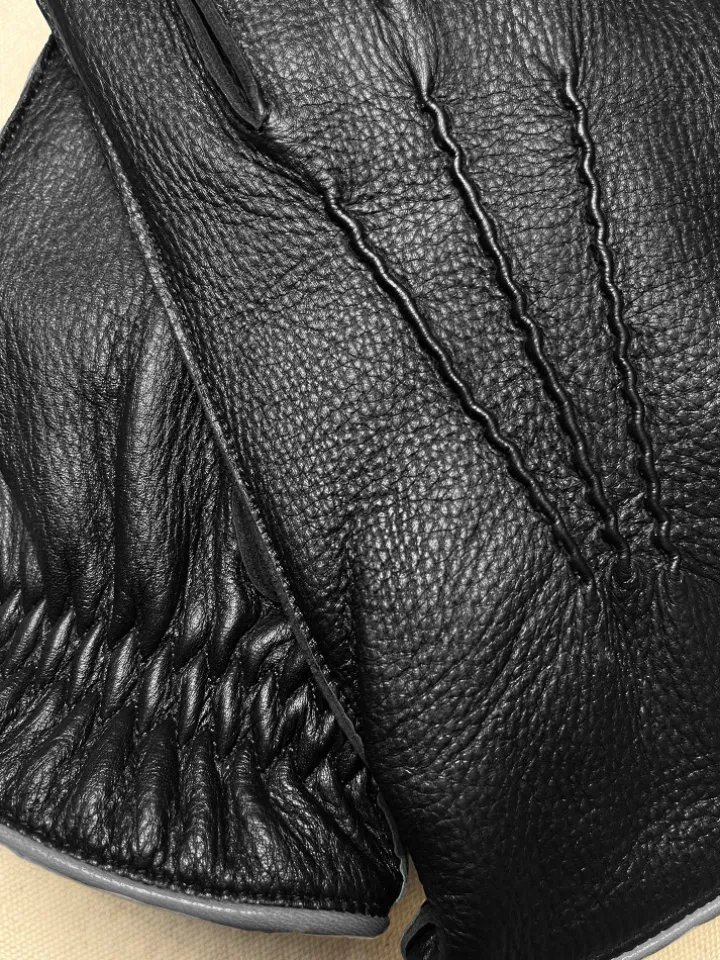 Gants en cuir tactiles noirs couture extérieure